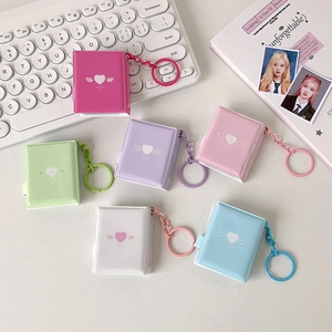 Mini photo card holders in six vibrant colors with heart wing patterns and keychains