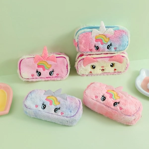 Detail of plush unicorn and cat pencil cases showing soft faux fur and cute embroidery