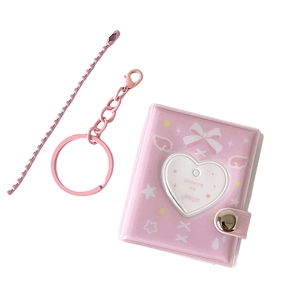 Pink 2-inch heart hollow photocard album with cute bow print and keychain straps