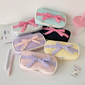 Pastel ballet-style pencil cases with large bows in six vibrant colors and double zippers