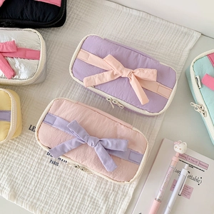 Cute large capacity bow pencil case in various pastel colors made of crinkle nylon fabric