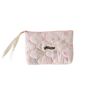 Quilted pink makeup bag with cartoon rabbit and floral patterns for daily storage