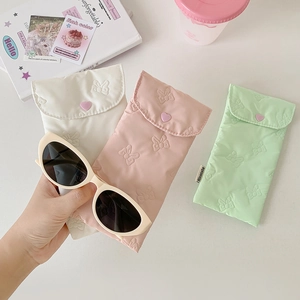 Quilted butterfly relief glasses pouches in macaron colors with heart-shaped buttons