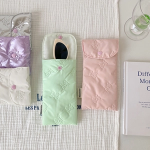 Pastel quilted puff sunglasses cases with contrast buttons and bow pattern in five colors