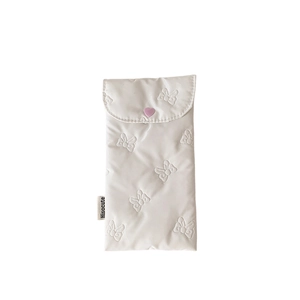 Quilted off-white storage bag with bow relief and heart button for eyewear or pens