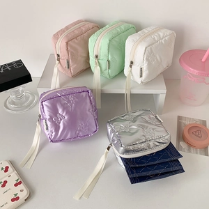 Five colorful quilted bow pattern square makeup bags for women with ribbon zipper puller