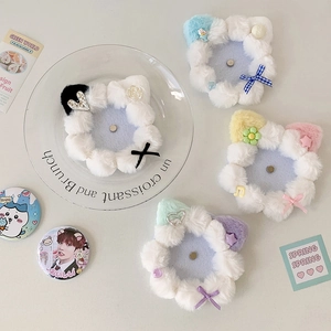 Plush 58mm cat ear badge holder detail with bows, stars and soft faux fur texture