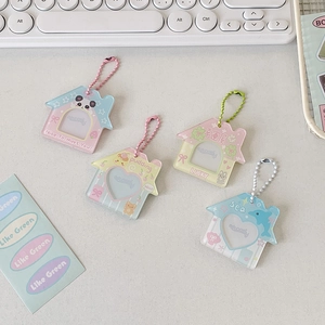 Mini house-shaped acrylic card holders with colorful bead chains for polaroid photos