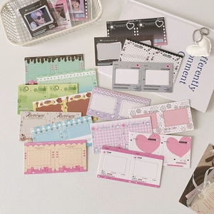 Flat lay of colorful Korean ins style DIY photocard frames and keychains in a white basket