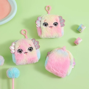 Detailed macro view of colorful plush monster coin purses with cute embroidered eyes