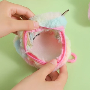 Rainbow plush coin purse with cartoon eyes, colorful fur, pink zipper and hanging hook