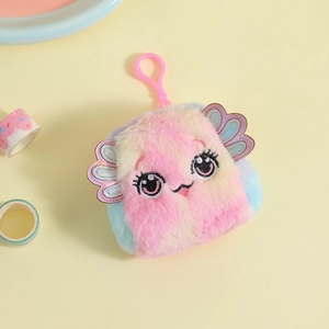 Detail of plush cartoon coin purse featuring large eyes, colorful wings, and pink hook