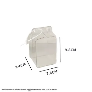 Clear PVC doll display case in milk carton shape with pearl handle, 9.8cm height