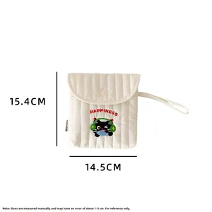 Detailed view of cream quilted sanitary pad pouch with cute cat embroidery and sizing