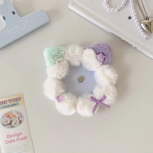 Detailed plush badge holder featuring colorful petals with a central magnetic button and bow