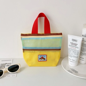 Dual-layer mesh beach bag with contrast colors, cartoon dog patch, and red handles