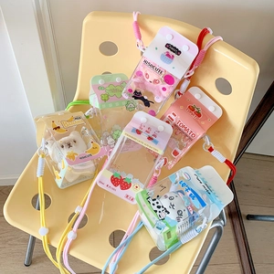 Detail of transparent milk box crossbody bags with plush toys and colorful straps