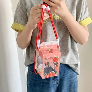 Pink translucent milk carton crossbody bag with cute strawberry prints and red rope strap