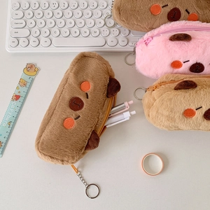 Close-up of plush Capybara pencil case with soft texture and cute embroidery details