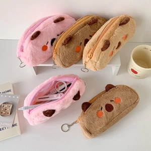 Cute plush bear-shaped pencil case in pink, brown, and beige with soft faux fur and embroidery