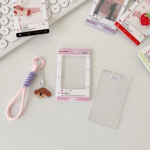 Detail view of cartoon ID card holder with slide cover and puppy acrylic charm