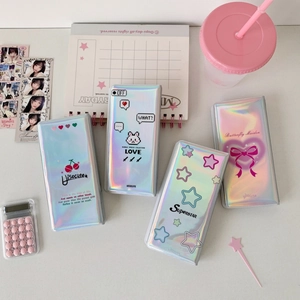 Macro detail of laser holographic PVC photo storage folders with cute graphic prints
