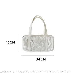 Bolso cilíndrico blanco acolchado con lazos, 34cm x 16cm y tirador de cremallera corazón