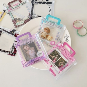 Detail of colorful clear PVC card holders with handles and cute bow star prints