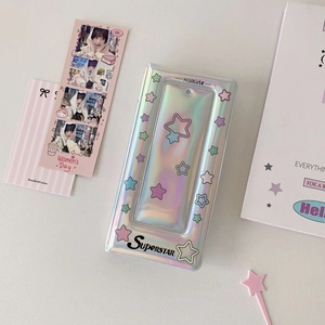 Detailed view of iridescent laser photocard binder with colorful star patterns and text