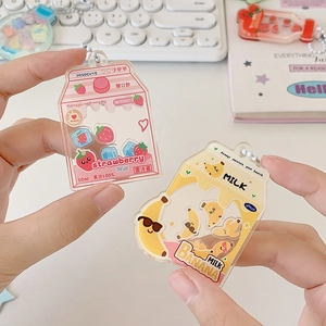 Cute acrylic fruit milk box keychains featuring strawberry and banana charms