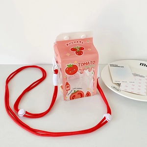 Detail of pink milk carton bag with transparent window and red rope shoulder strap