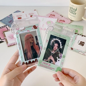 Transparent aesthetic photocard holders in mint and lime green with cute heart patterns