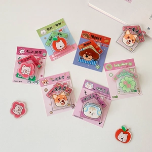 Detailed view of cute acrylic animal fridge magnets with assorted cartoon dog and cat designs