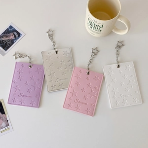 Detail of PU leather star embossed card holders with superstar text and star metal clips