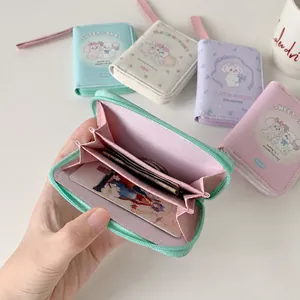Detail of accordion multi-slot interior in a pastel PU leather cartoon coin purse