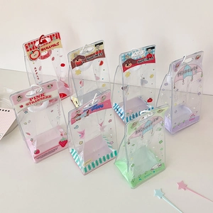Detail of seven thick PVC transparent gift bags with strawberry and puppy cute patterns