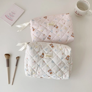 Quilted cotton makeup bags with cute bear patterns in pink and beige colors
