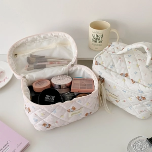 Beauty case trapuntato a fiori con cerniera e tasca a rete per i viaggi e trucco