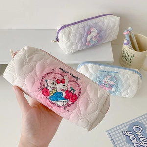 Quilted heart pencil cases in pastel pink, purple, and blue featuring cute cartoon rabbit prints