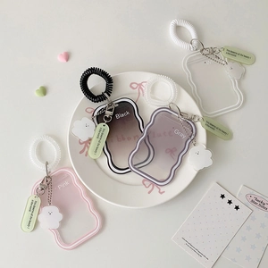 Acrylic card holders with wavy borders and colorful lanyards for student IDs
