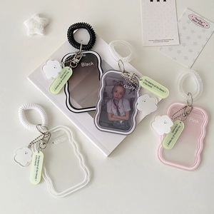 Soft silicone photocard holders in black, gray, white and pink with spiral wristbands