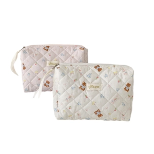 Quilted cotton cartoon makeup bag set with bear and floral patterns in pink and beige