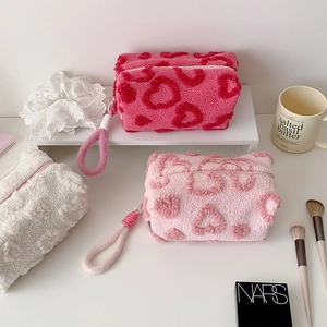 Detailed plush teddy velvet heart pattern makeup bag showing texture and zipper