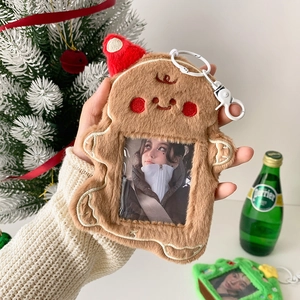 Portafoto in peluche a forma di omino di pan di zenzero con cappello natalizio