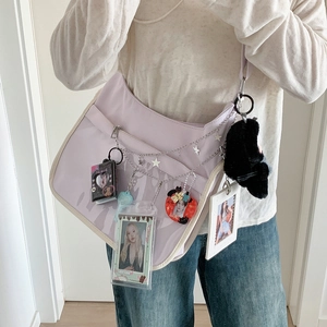 Lavender crescent canvas crossbody bag with silver star chains and k-pop aesthetic charms