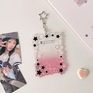 Detail of pink gradient acrylic photo card holder with star metal clasp and printed pattern