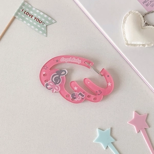 Pink acrylic carabiner detail with Angel Baby text and musical notes for backpacks