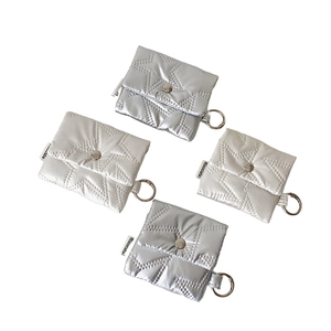 Silver and beige star quilted mini crossbody earphone bag with metallic finish