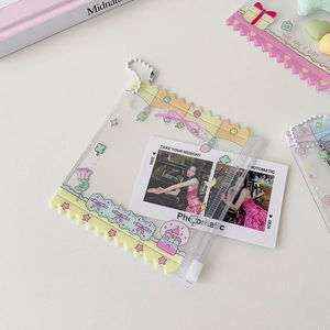 Detail of transparent PVC photo card holder with cute pink roses and stars pattern