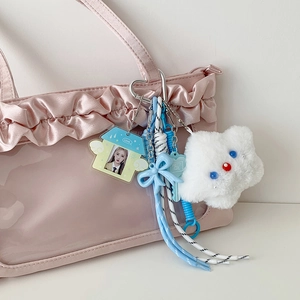 Ciondolo a stella in peluche bianca con cornice in acrilico su borsa rosa
